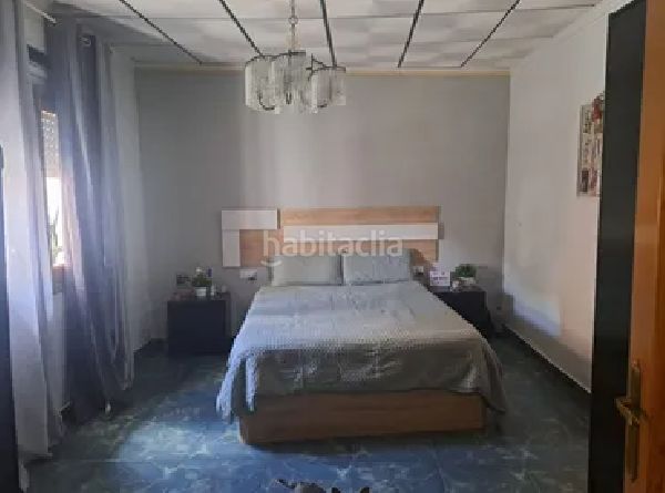 Foto ec17849c-0412-4cc1-bcb1-b3e3bd7fc817. Casa aparellada a Centro Rojales