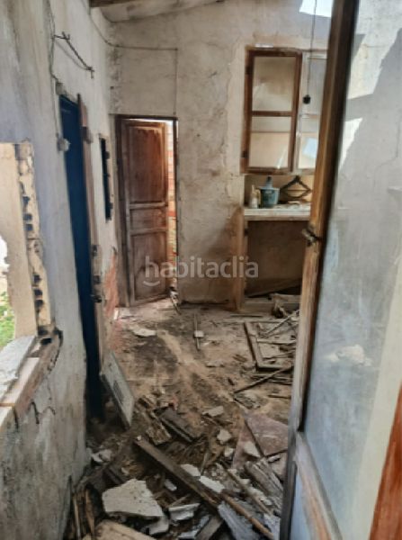 Foto 44d33e96-af4e-4b5b-b77a-b19aef1dc286. Casa aparellada a Benejúzar