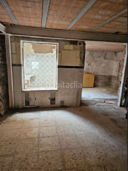 Foto f5373a3b-51c8-452e-bc85-33b57fba7900. Casa aparellada a Novelda