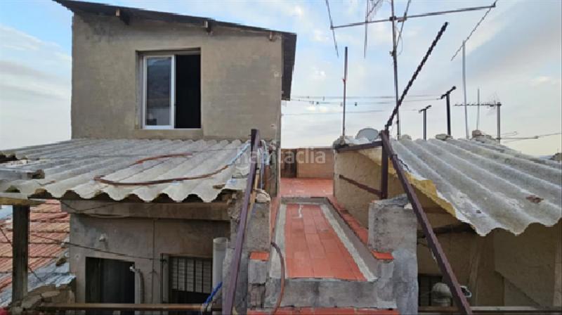 Foto f4cb95fb-7a53-4653-b1f2-bf5236ffb6e8. Casa aparellada a Callosa de Segura