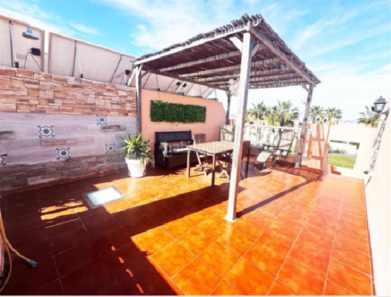 Foto a210a048-bc2f-4509-8f9d-9415858195e5. Duplex with parking pool in Las Piscinas Naturales Torrevieja