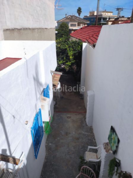 Foto 14555cdd-4c7c-457d-81c0-ecd42e1d0f3c. Casa aparellada a Rojales