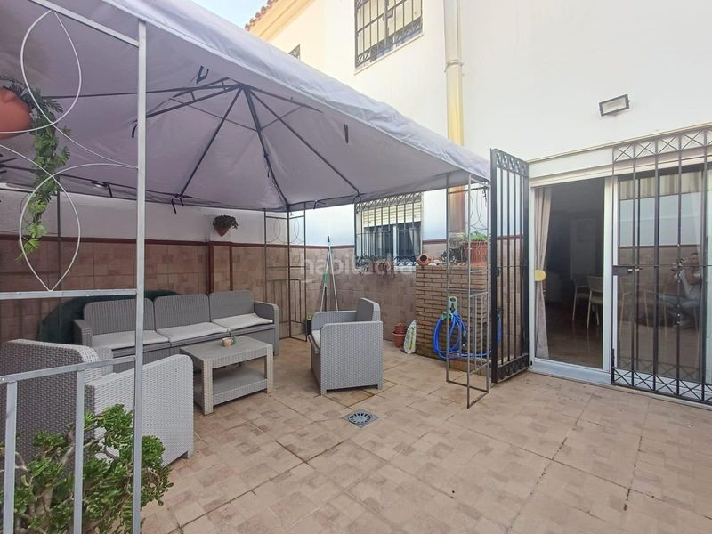 Foto e7950afd-a2e6-49bd-8362-79d4a2ab87a8. Casa adossada a Coria del Río
