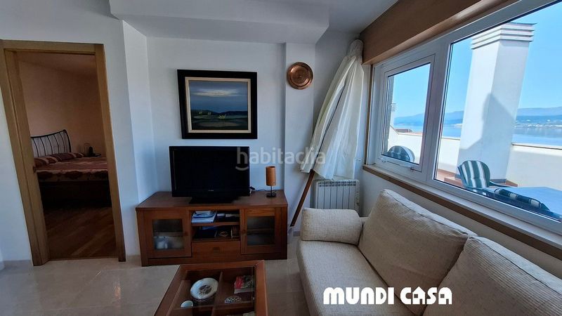 Foto ea9920ff-cf75-438d-9010-46fc397c4175. Apartament amb calefacció aparcament a Rianxo