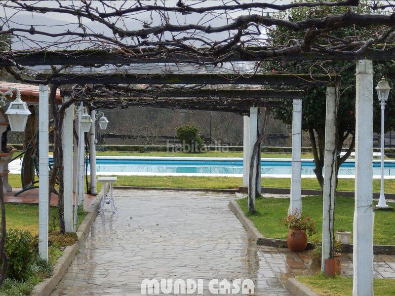 Foto b51d10dc-ba7b-42ef-9c89-138b68703725. Masia amb calefacció aparcament a Padrón