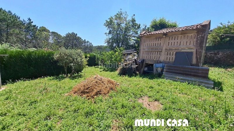 Foto 094daac8-10a4-4e60-96f1-34dc592fcadc. Casa amb aparcament a Boiro