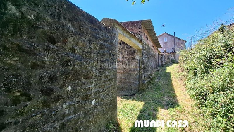 Foto 1227597c-e831-4be4-90c8-f24f55c213d4. Casa amb aparcament a Boiro