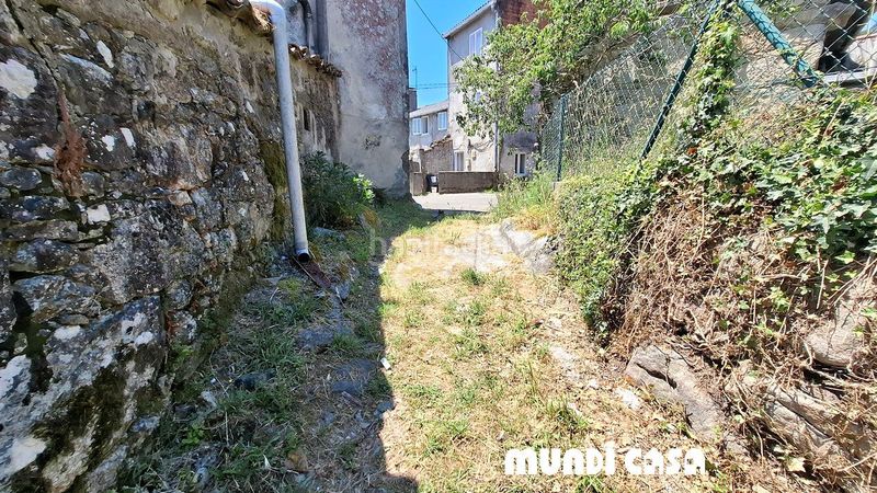 Foto d52264c3-d1e7-4b5e-8ce5-29cd5a89dc07. Casa amb aparcament a Boiro