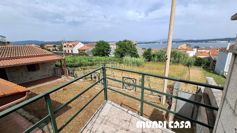 Foto bd926894-4413-49ca-8452-bebe451a69ae. Casa a Boiro