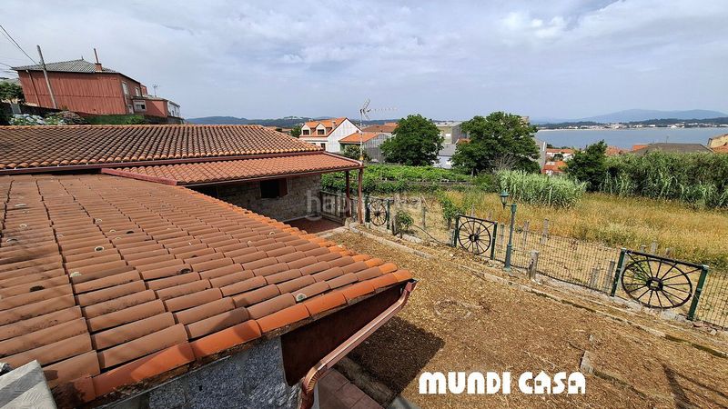 Foto d2b411f4-f92e-46ce-a25b-c54952d52af7. Casa a Boiro