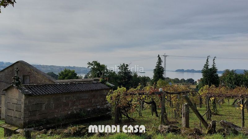 Foto b19fd4d9-9f08-4c05-b242-451e3485a15c. Casa a Rianxo