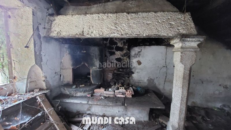 Foto dcd1c253-b70e-45b3-bfc9-ef5f844b74c4. Casa a Rianxo
