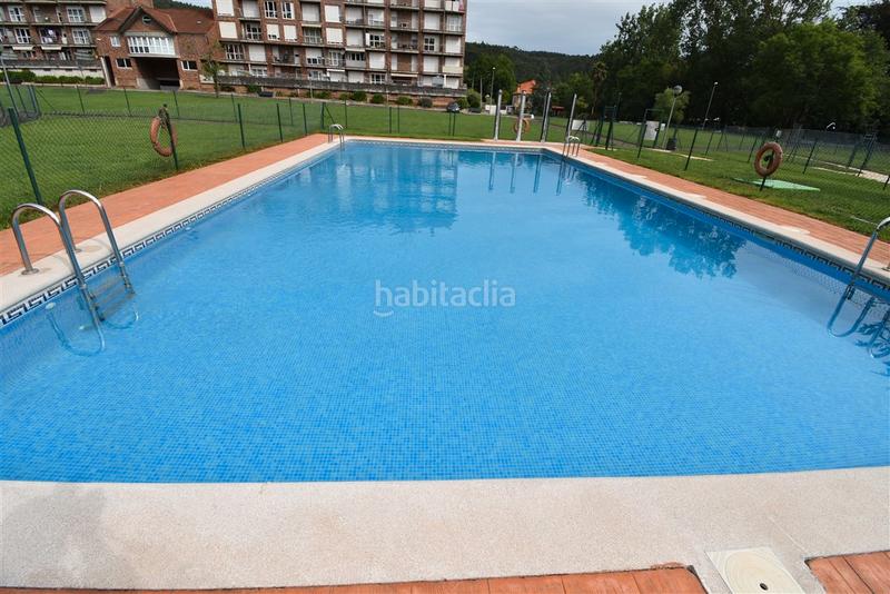 Foto 4af93f8e-6f2b-46c3-bd78-1a80d5273c11. Planta baja bajo con terraza en urbanizacion privada con piscinas en Hazas de Cesto