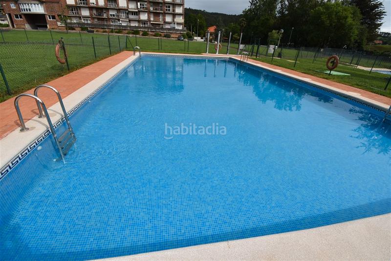 Foto 69c737e5-38f4-4a96-b625-bf9e2b3bcfe5. Planta baja bajo con terraza en urbanizacion privada con piscinas en Hazas de Cesto