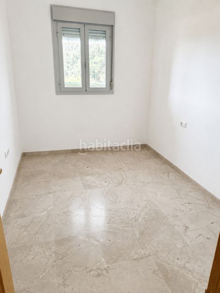 Foto 185a9db5-4376-4447-add5-a7ea25a73730. Pis amb calefacció aparcament piscina a Bellavista Sevilla