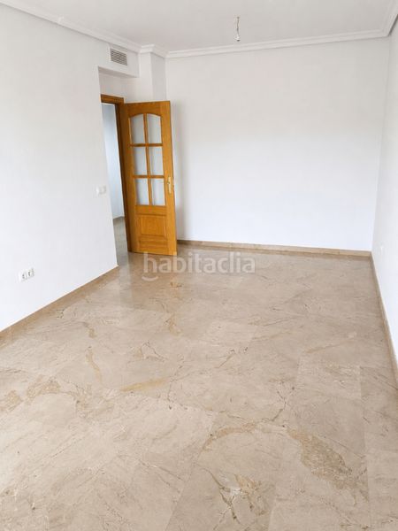 Foto 47c3689c-973b-4236-bd0e-ca01c97bba38. Pis amb calefacció aparcament piscina a Bellavista Sevilla