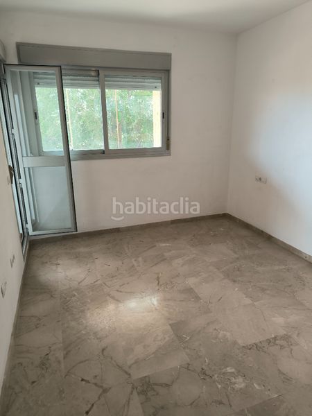 Foto 54e1e9aa-7990-450e-9e6c-4c208b31e5e0. Pis amb calefacció aparcament piscina a Bellavista Sevilla