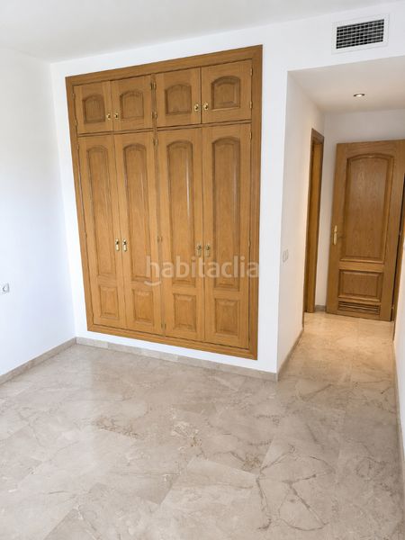 Foto a2fc4d1d-cf4c-4e3f-8959-a1a946989f4c. Pis amb calefacció aparcament piscina a Bellavista Sevilla