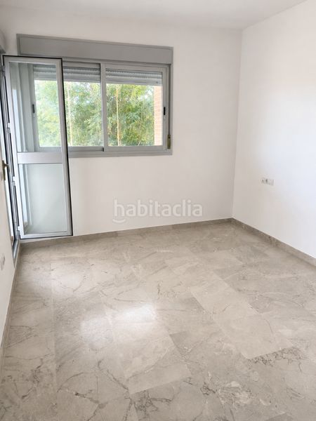 Foto e261835f-5dcf-4e66-b750-f394a41257bb. Pis amb calefacció aparcament piscina a Bellavista Sevilla