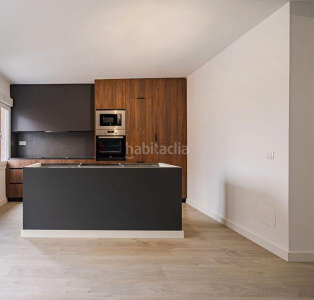 Foto 424a497c-8faf-4074-893d-54f7ac61ad3a. Flat with heating in Bellas Vistas Madrid