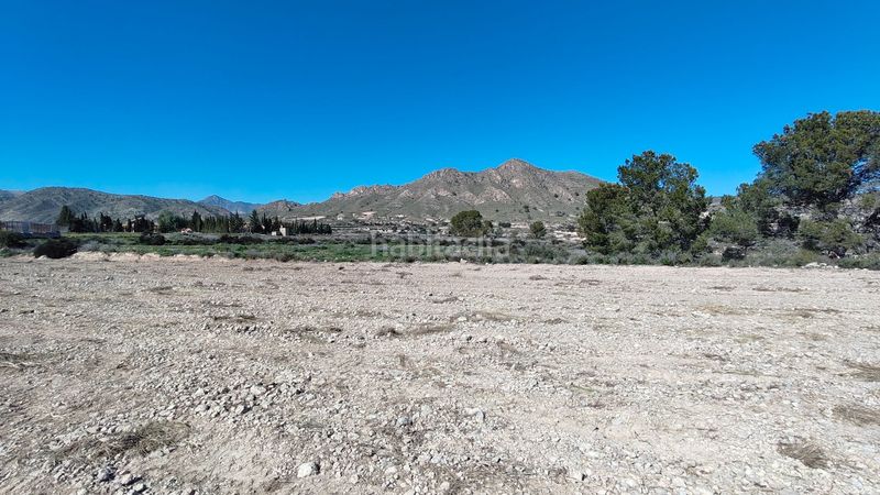 Foto 9fada81d-e245-4076-a8fe-a38d3b35d9d8. Finca rústica parcela urbanizable de 7.984 m con agua potable en Abanilla