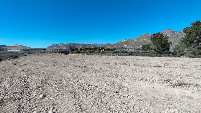 Foto af002371-e8c9-4f4c-8acf-7145debdb557. Finca rústica parcela urbanizable de 7.984 m con agua potable en Abanilla