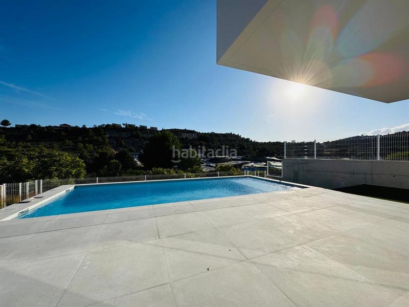 Foto 5ed847d5-3282-40e2-bde3-f517e656a510. Chalet mit heizung parking pool in balcón de Finestrat-terra marina Finestrat