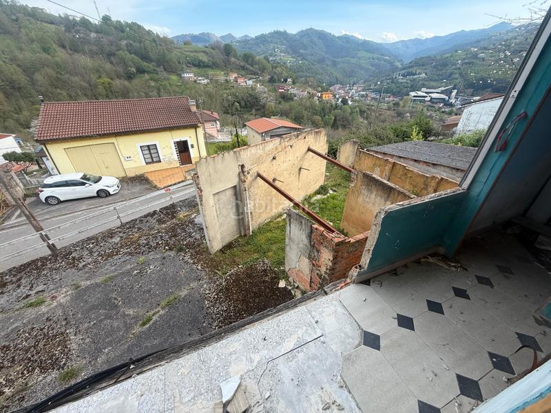 Foto 27b990a3-b59d-41f8-b616-e12aaad7c579. Casa finca para rehabilitar en entorno rural con vistas espectaculares – en Langreo