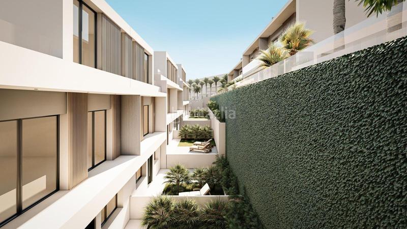 Foto f5de16a2-b019-4a9b-8403-14d17d771b47. Casa pareada villas adosadas con vistas al mar y junto al campo de golf en Estepona