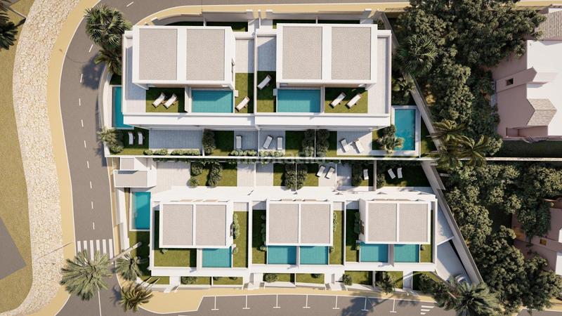 Foto fa55ff7a-6283-4dd8-a9d9-9941cbe9f9ba. Casa pareada villas adosadas con vistas al mar y junto al campo de golf en Estepona