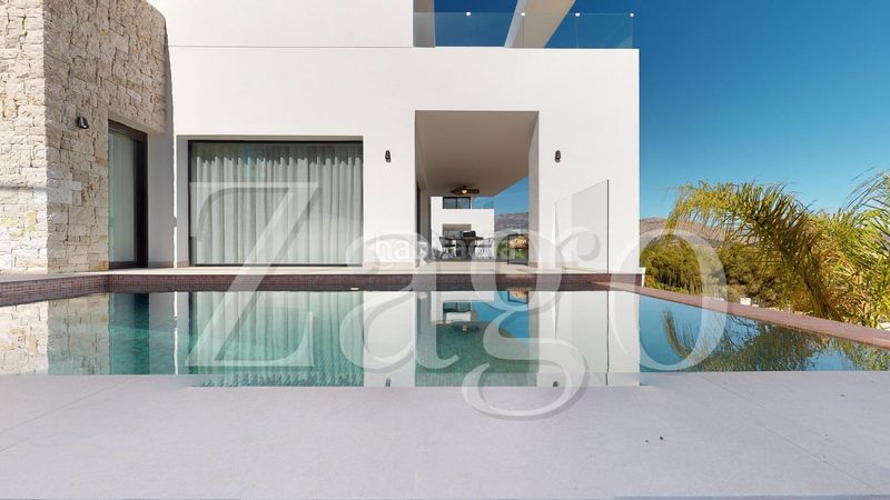 Foto 5182359e-d013-4a1e-addf-2776d597b6d9. Casa amb aparcament a balcón de ponoig - Polop paradis - Polop hills Polop