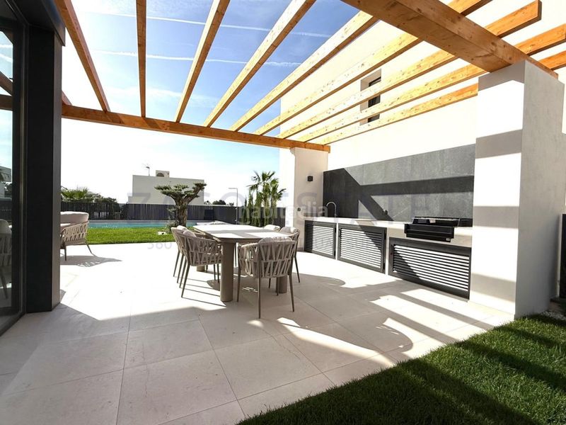 Foto f6dae44d-765f-4e81-a7a6-a0ddaf91ece3. Casa amb aparcament a Golf Bahía Finestrat