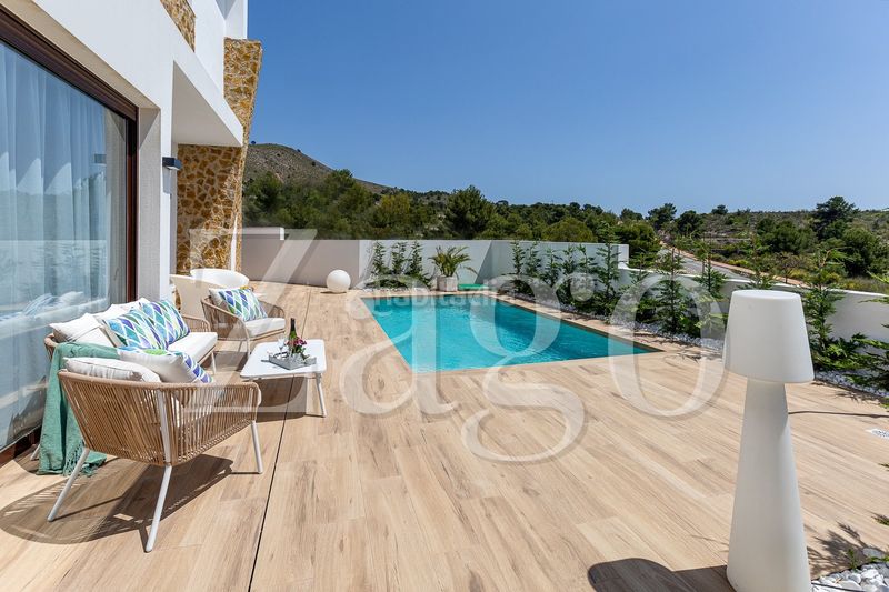 Foto c3620d0d-925b-4de6-ac0a-b9787d8a4f84. Casa amb aparcament a Golf Bahía Finestrat