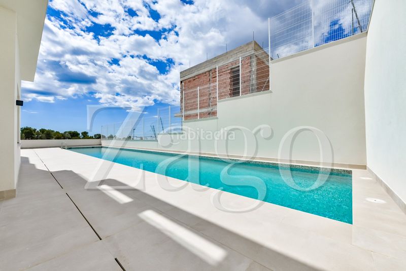 Foto b4e6e680-4945-47f1-832f-4d60ea65fe5a. Casa amb aparcament a Golf Bahía Finestrat