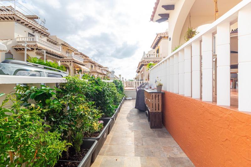 Foto 0f477df2-8c6c-47be-abab-045a7725bd39. Casa en calle atalaya adosado de 2 dormitorios 2 baños en lomas de cabo roig te espera! costa en Orihuela