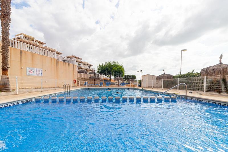 Foto 1c04ca1c-af2f-4ec2-a692-113f46808ce2. Casa en calle atalaya adosado de 2 dormitorios 2 baños en lomas de cabo roig te espera! costa en Orihuela