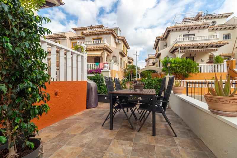 Foto a29a298c-120a-46af-995e-6eb05e17ecf8. Casa en calle atalaya adosado de 2 dormitorios 2 baños en lomas de cabo roig te espera! costa en Orihuela