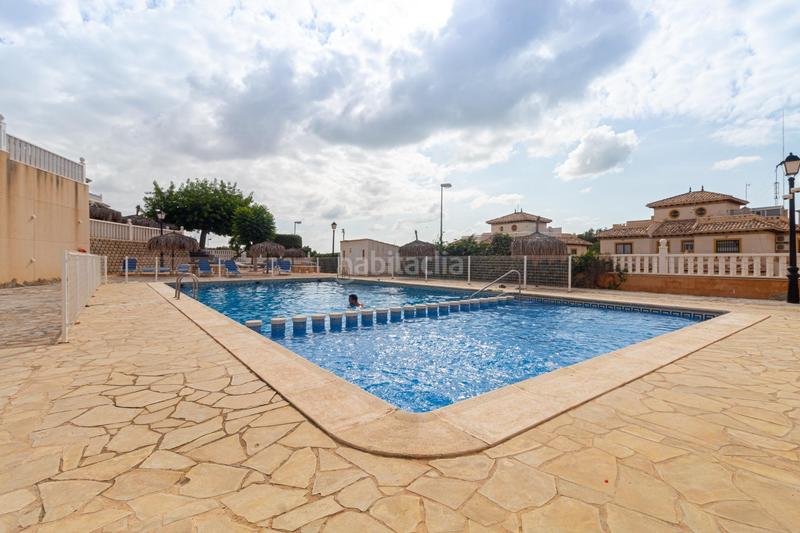 Foto ee4baf45-97cb-498f-9866-4e4ce1d6c476. Casa en calle atalaya adosado de 2 dormitorios 2 baños en lomas de cabo roig te espera! costa en Orihuela