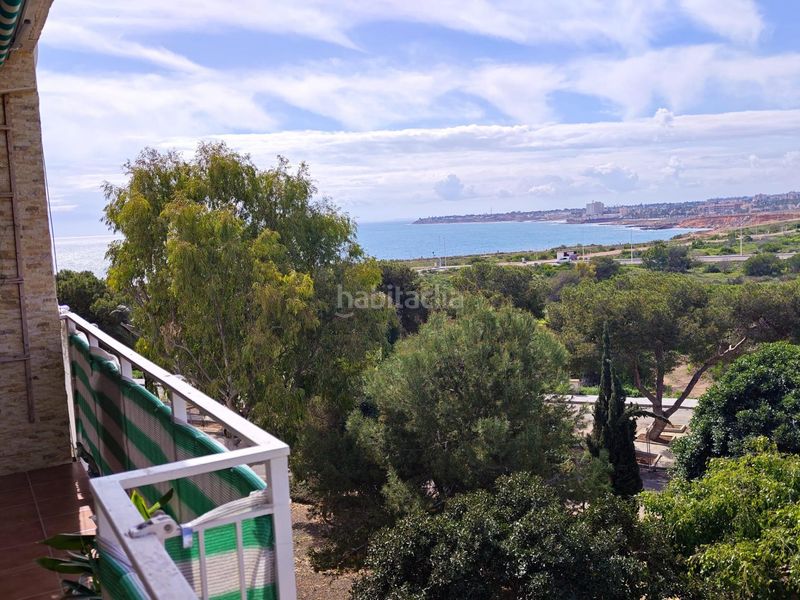 Foto cb69d8bc-64c8-467b-a64e-f988ebcfc95c. Apartament a Punta Prima Orihuela