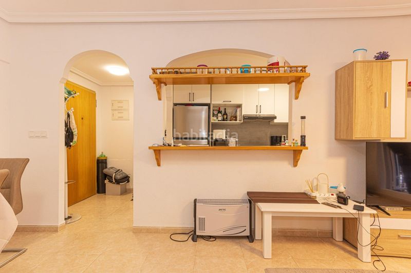 Foto 4e51e0bc-cf0e-4a85-86e6-7ee748594cab. Apartamento  de 2 dormitorios 2 baños con terraza en Playa Flamenca costa urb. laguna golf en Orihuela