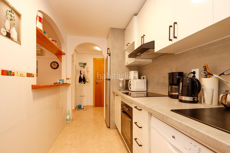 Foto 6c5d4d77-9c22-49b4-bbdc-87bd11e4de2f. Apartamento  de 2 dormitorios 2 baños con terraza en Playa Flamenca costa urb. laguna golf en Orihuela