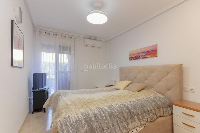 Foto e48253c0-8cf4-4fed-a64d-fd20b2c0dd48. Apartamento  de 2 dormitorios 2 baños con terraza en Playa Flamenca costa urb. laguna golf en Orihuela