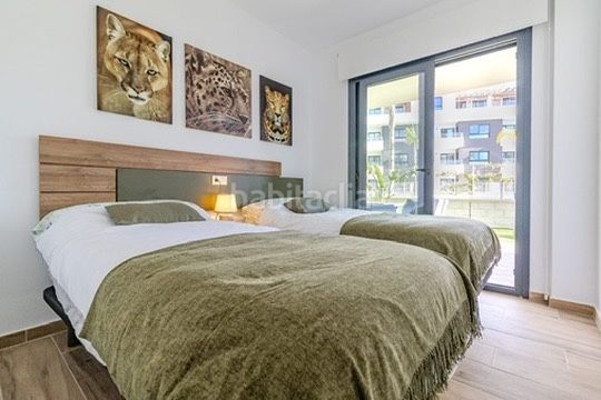 Foto da2045b6-6b99-46df-9995-8ddaad789574. Appartement mit parking pool in Villamartín-Las Filipinas Orihuela