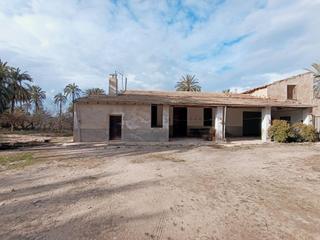Casa a Algorós - El Derramador. Casa de campo adosada, con áljibe y tres parcelas productivas de
