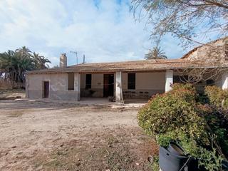 Casa a Algorós - El Derramador. Casa de campo adosada, con áljibe y tres parcelas productivas de