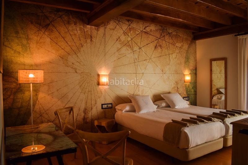 Foto 932e0c02-fad6-4bb5-99d5-47e2405b40c8. Edifici a Cartes