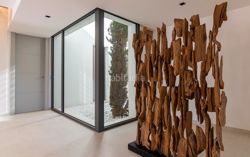 Foto b4915ba9-cfb5-41f6-8878-e1ec8c50f288. Casa amb aparcament piscina a La Quinta Benahavís