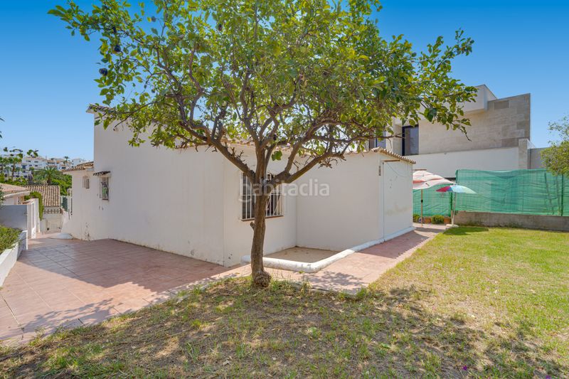 Foto 0671c0f3-264d-40bc-8c87-56a760238d7d. Casa amb aparcament piscina a Nueva Andalucía centro Marbella