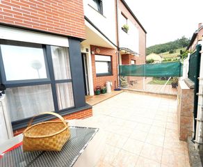 Casa adossada  El jurrio 34. Piélagos parbayón adosado con jardín terraza, dos dormitorios y