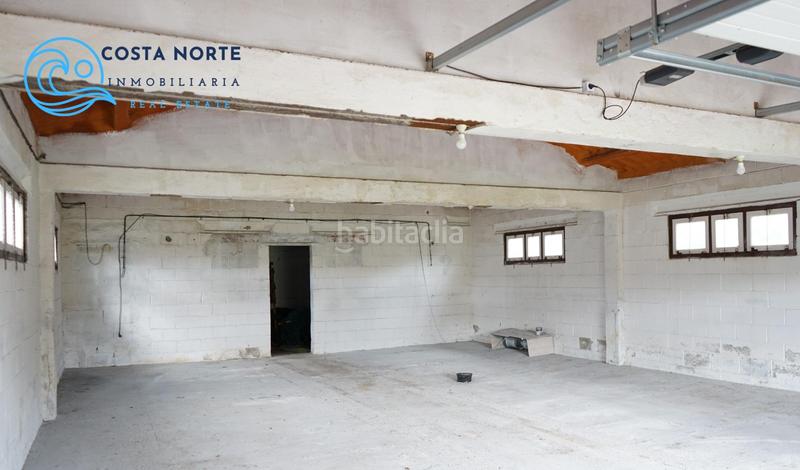 Foto 22685c8a-0ac4-4827-9fff-a1e2398fba70. Fabrikhalle in barrio helguera 91 in Reocín